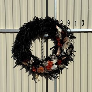 Chic Black Feather Wreath with Autumn Hues